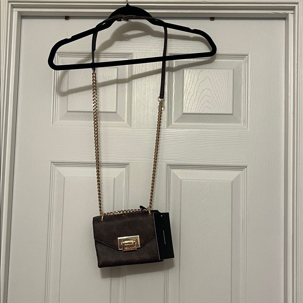 Elegant Brown Crossbody Bag with Gold Chain
By Nicole Miller